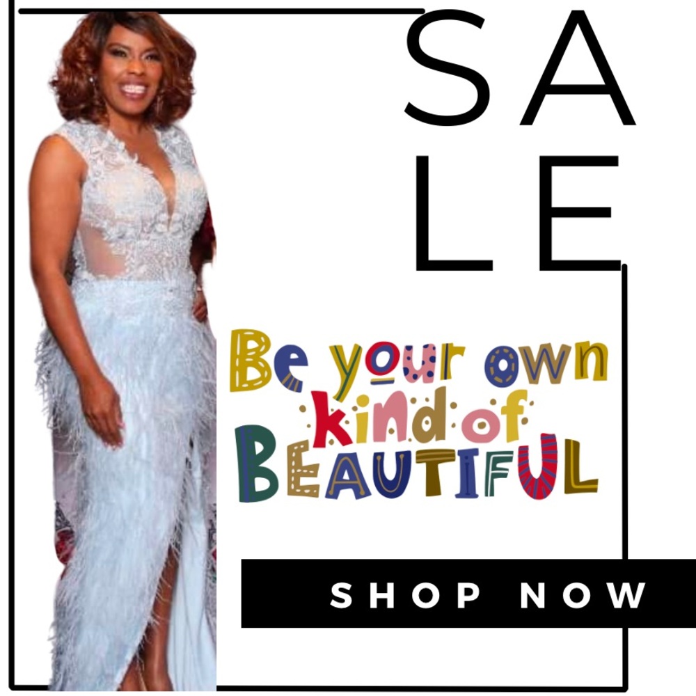 Beautiful feathered evening gown. Great condition.